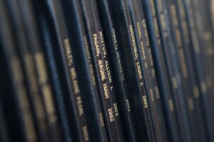 Picture of dissertations on a book shelf